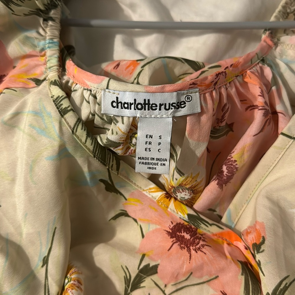 Tan floral flowy dress. Ties on the side.